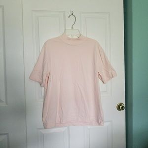 light pink turtleneck t-shirt